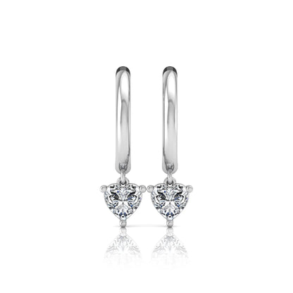 Heart cut lab grown diamond drop huggie hoop earrings featuring a three prong drop setting, hinged snap closure, and polished white gold tone finish.