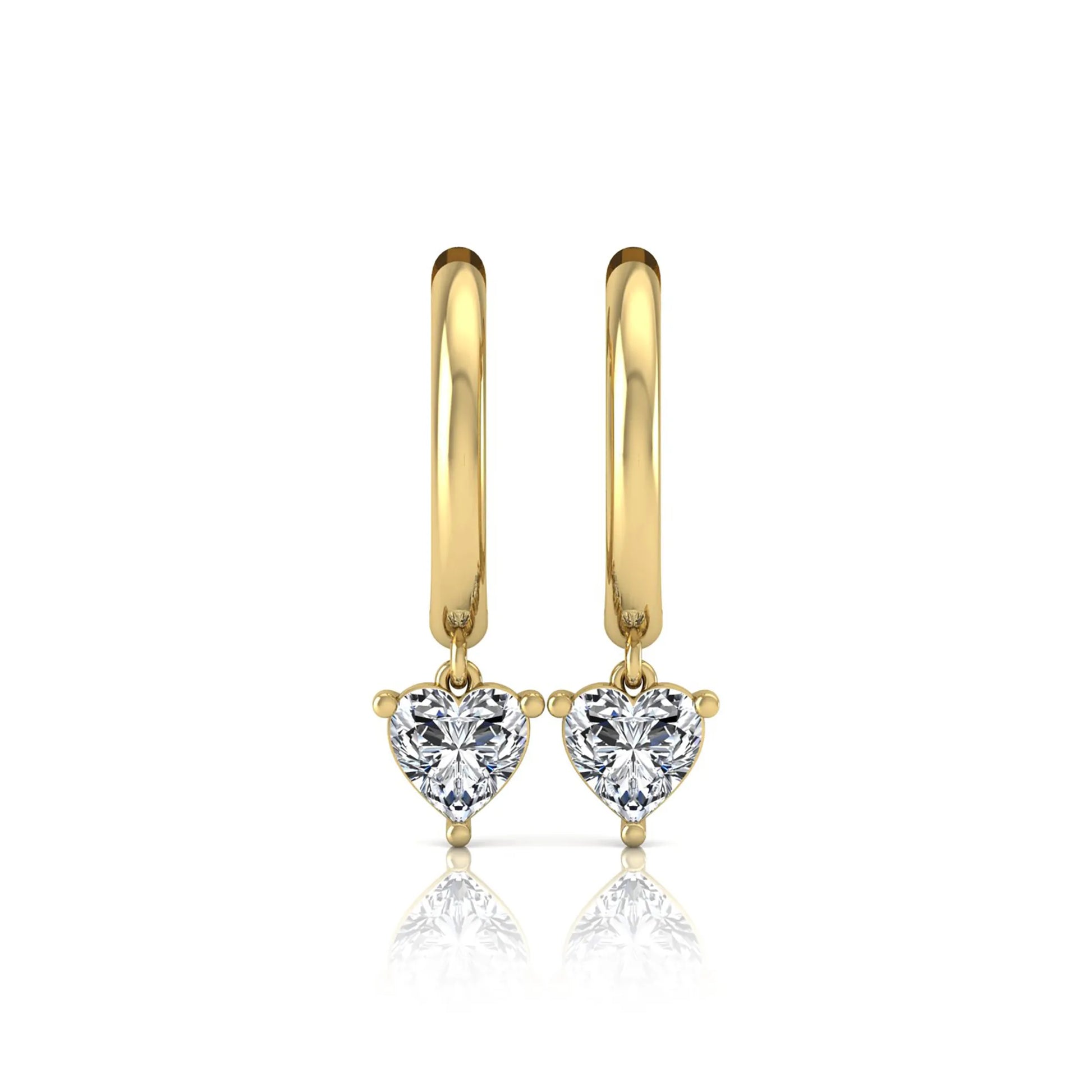 Heart cut lab grown diamond drop huggie hoop earrings featuring a three prong drop setting, hinged snap closure, and polished yellow gold tone finish.