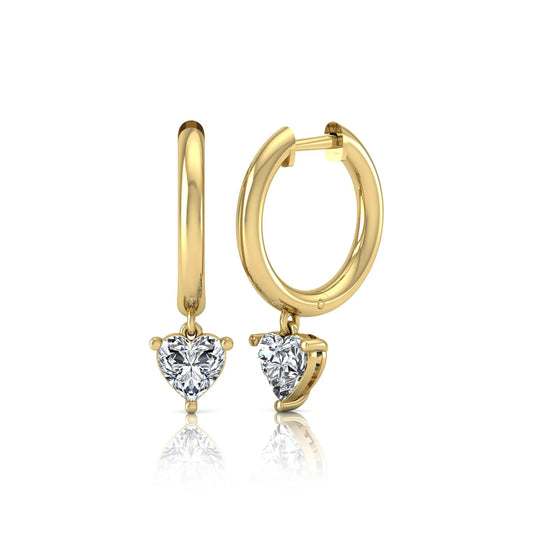 Heart cut lab grown diamond drop huggie hoop earrings featuring a three prong drop setting, hinged snap closure, and polished yellow gold tone finish.