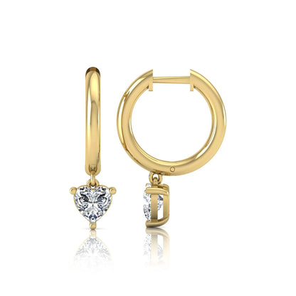 Heart cut lab grown diamond drop huggie hoop earrings featuring a three prong drop setting, hinged snap closure, and polished yellow gold tone finish.