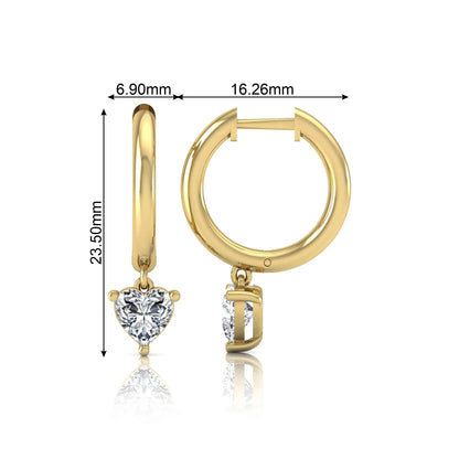 Heart cut lab grown diamond drop huggie hoop earrings featuring a three prong drop setting, hinged snap closure, and polished yellow gold tone finish.