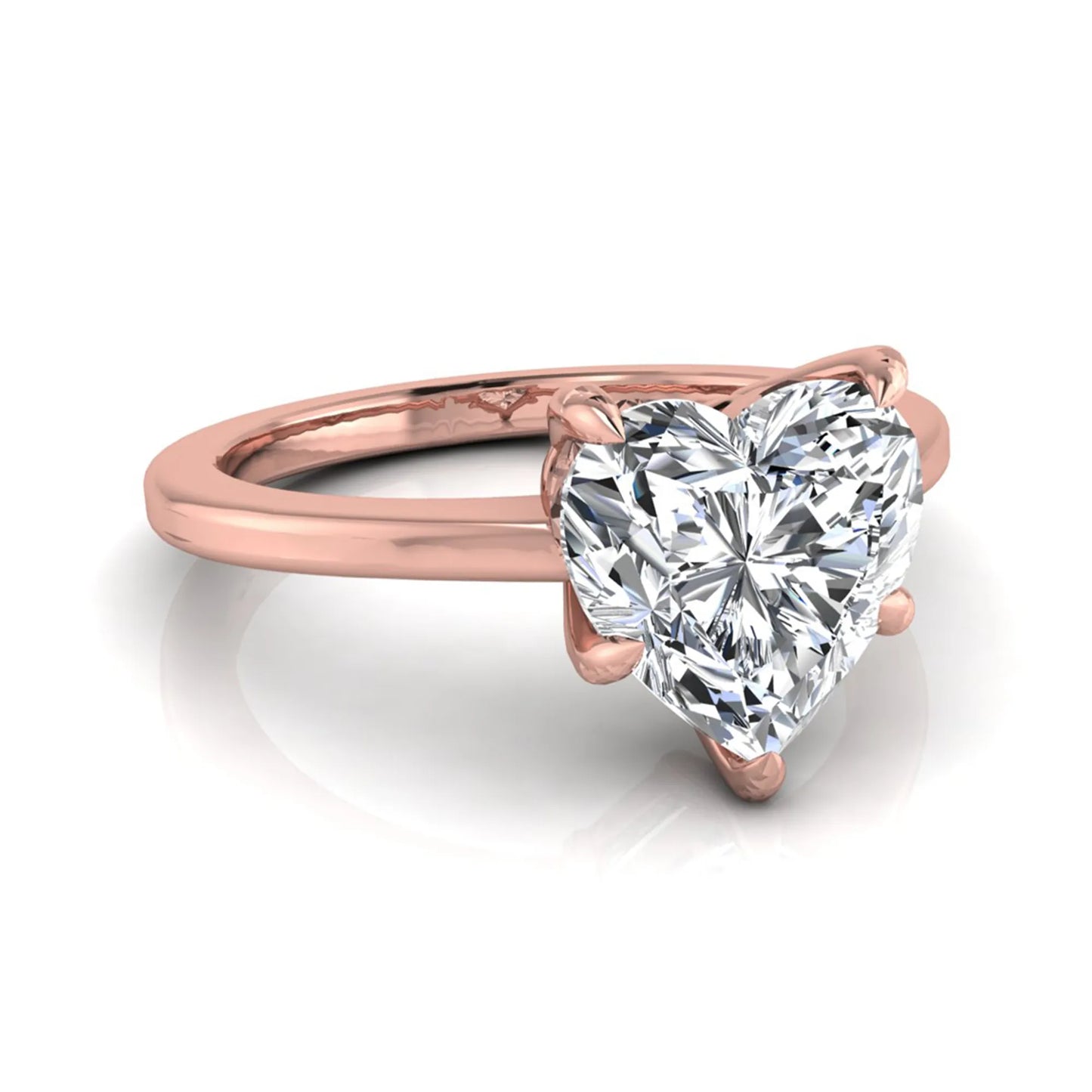 Heart cut lab grown diamond solitaire engagement ring with a five prong setting in a rose gold tone, featuring an IGI certified 1.71 carat center diamond.