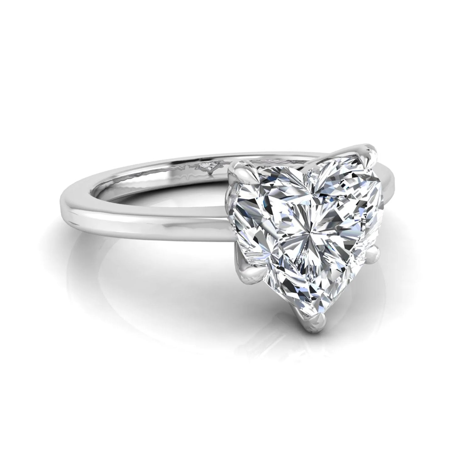 Heart cut lab grown diamond solitaire engagement ring with a five prong setting in a white gold tone, featuring an IGI certified 1.71 carat center diamond.