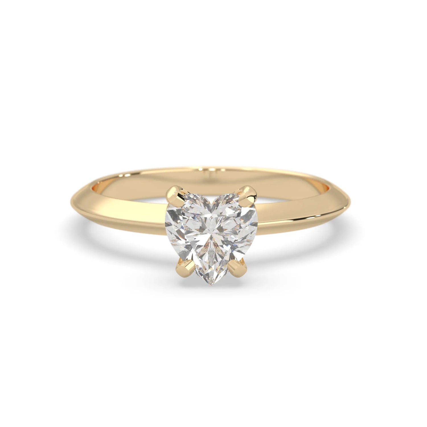 yellow-Gold ring with a heart-shaped diamond on a white background