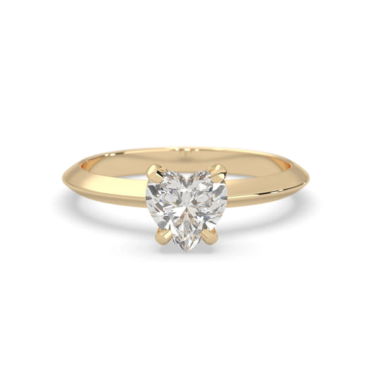 yellow-Gold ring with a heart-shaped diamond on a white background