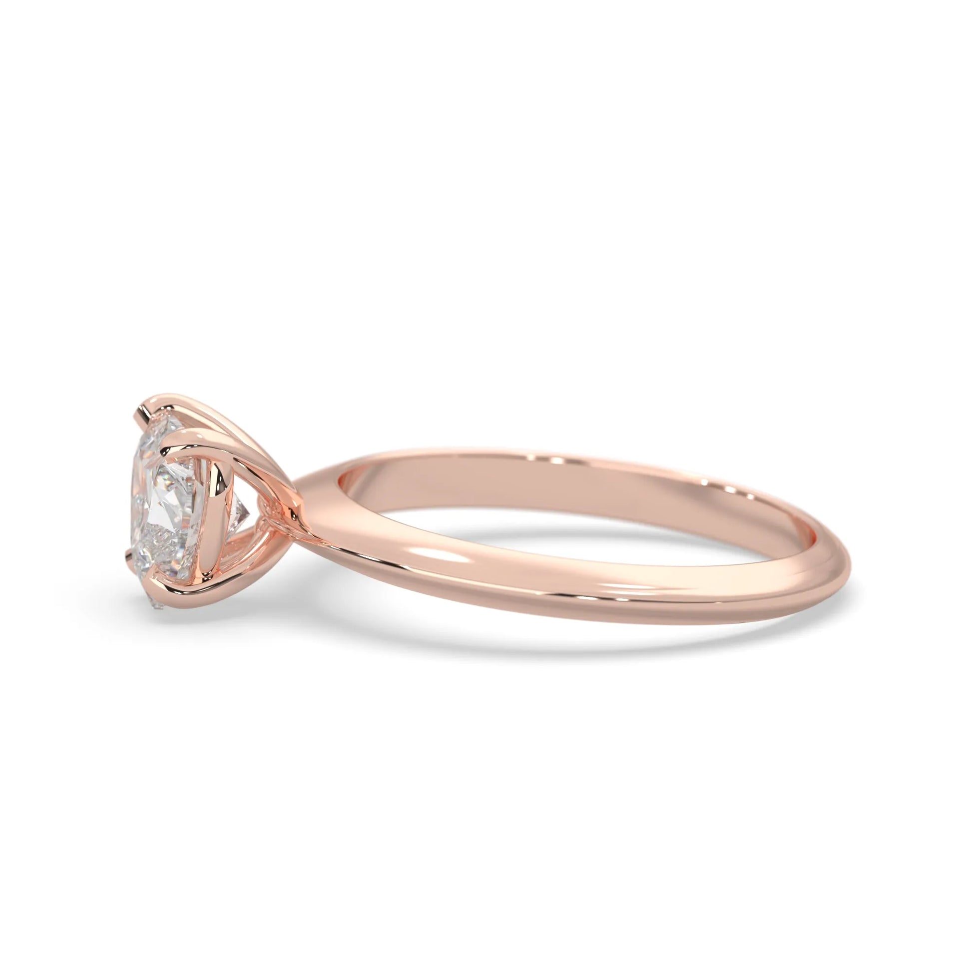 Rose-gold ring with a diamond on a white background