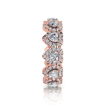 Heart halo lab grown diamond eternity band featuring heart cut diamonds surrounded by round diamond halos in a luxurious full eternity design in rose gold