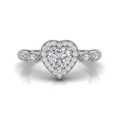 Heart cut halo lab grown diamond engagement ring with round diamond halo, infinity-inspired band, and white gold metal tone.