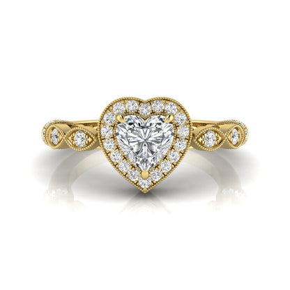 Heart cut halo lab grown diamond engagement ring with round diamond halo, infinity-inspired band, and yellow gold metal tone.