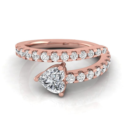 Heart cut lab grown diamond double wrap ring with pavé round diamond bands in polished rose gold.