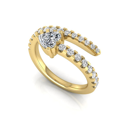 Heart cut lab grown diamond double wrap ring with pavé round diamond bands in polished yellow gold.