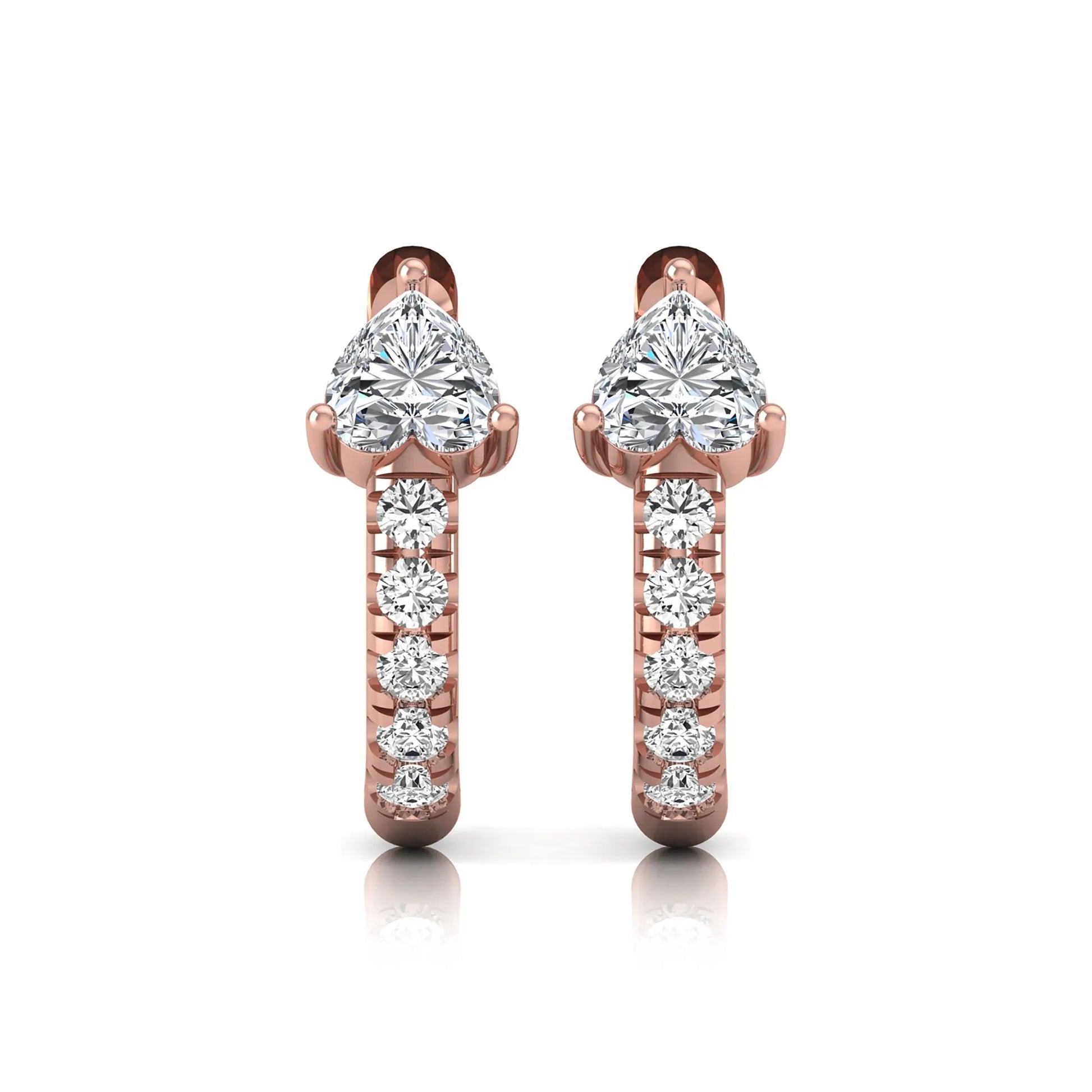Heart cut lab grown diamond huggie hoop earrings featuring a three prong basket set center diamond with round brilliant pavé diamonds on a rose gold hoop.