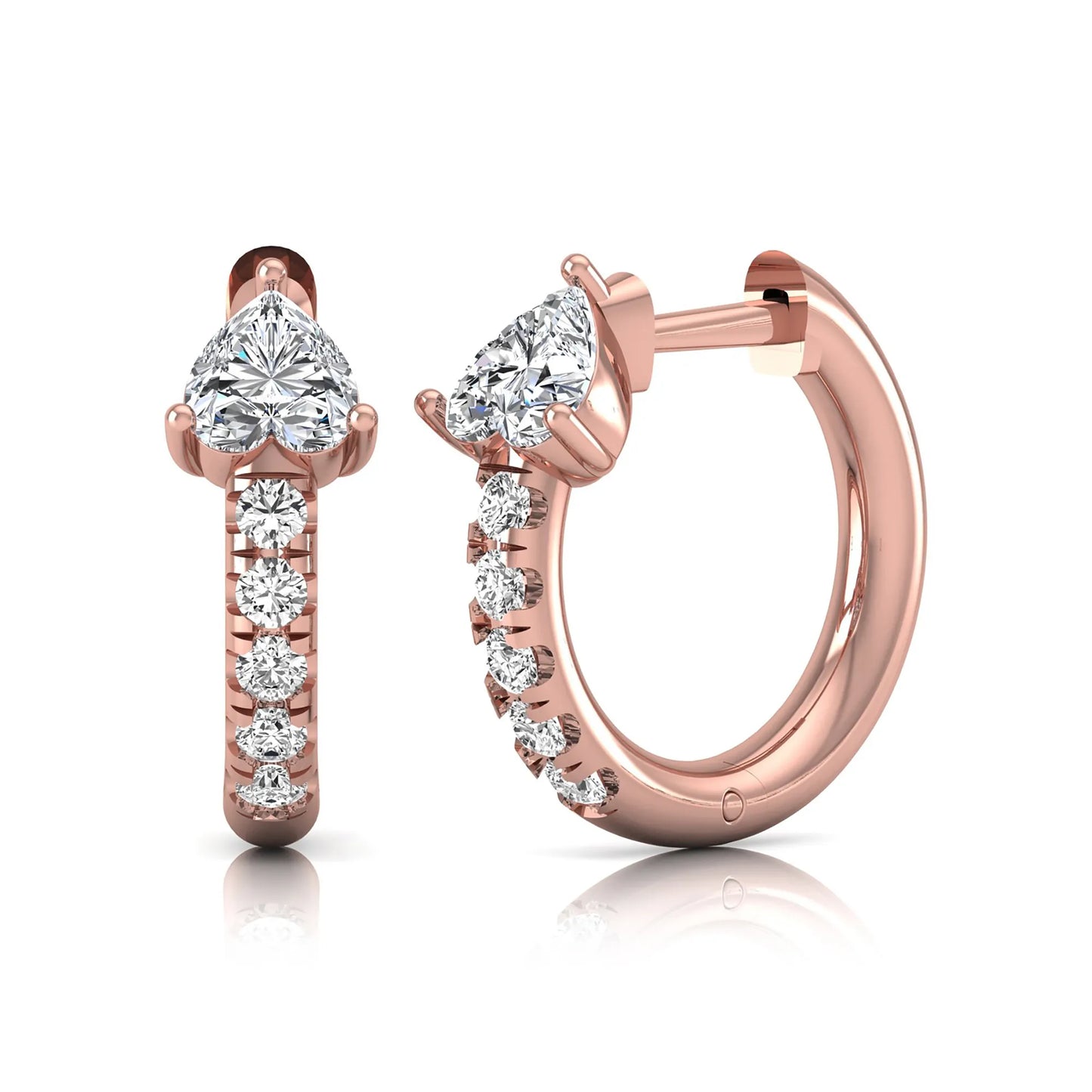 Heart cut lab grown diamond huggie hoop earrings featuring a three prong basket set center diamond with round brilliant pavé diamonds on a rose gold hoop.