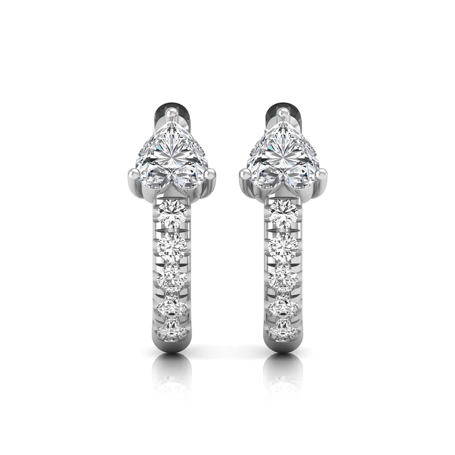 Heart cut lab grown diamond huggie hoop earrings featuring a three prong basket set center diamond with round brilliant pavé diamonds on a white gold hoop.