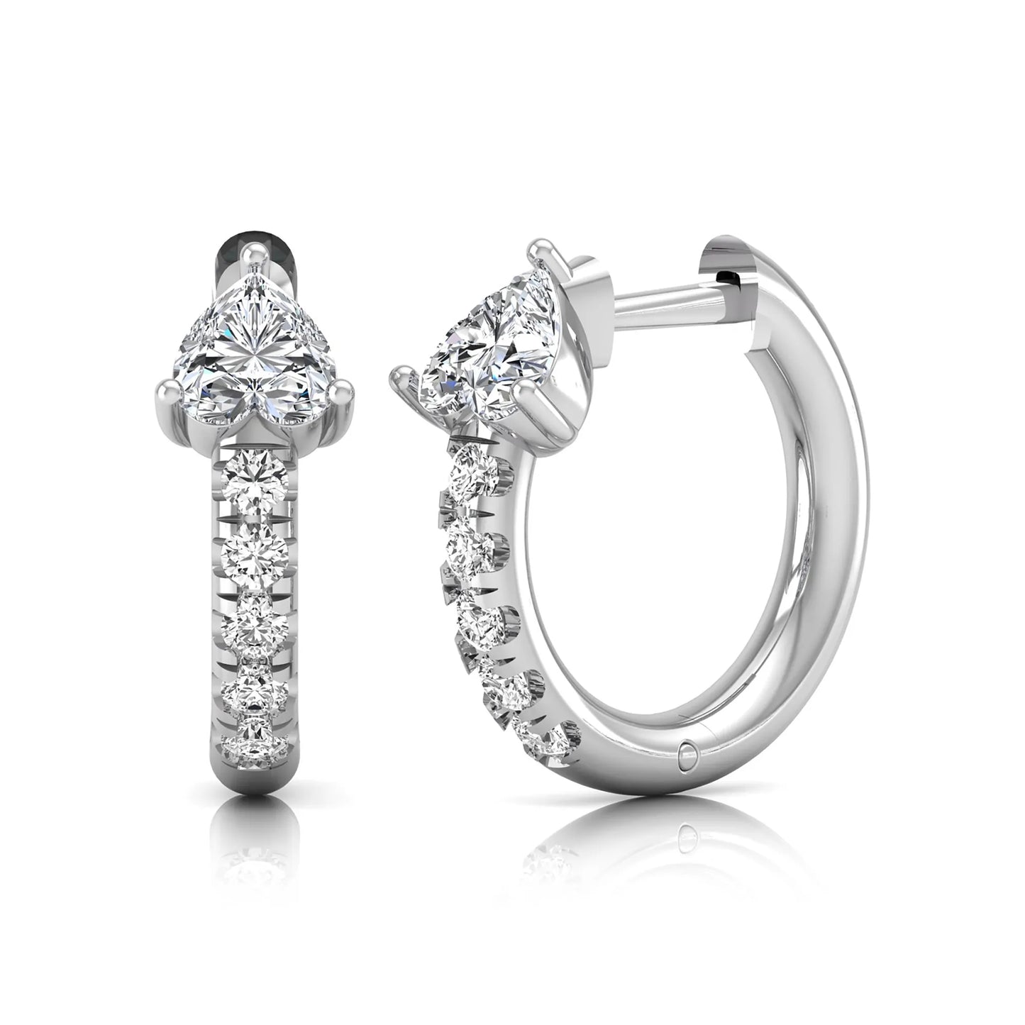 Heart cut lab grown diamond huggie hoop earrings featuring a three prong basket set center diamond with round brilliant pavé diamonds on a white gold hoop.