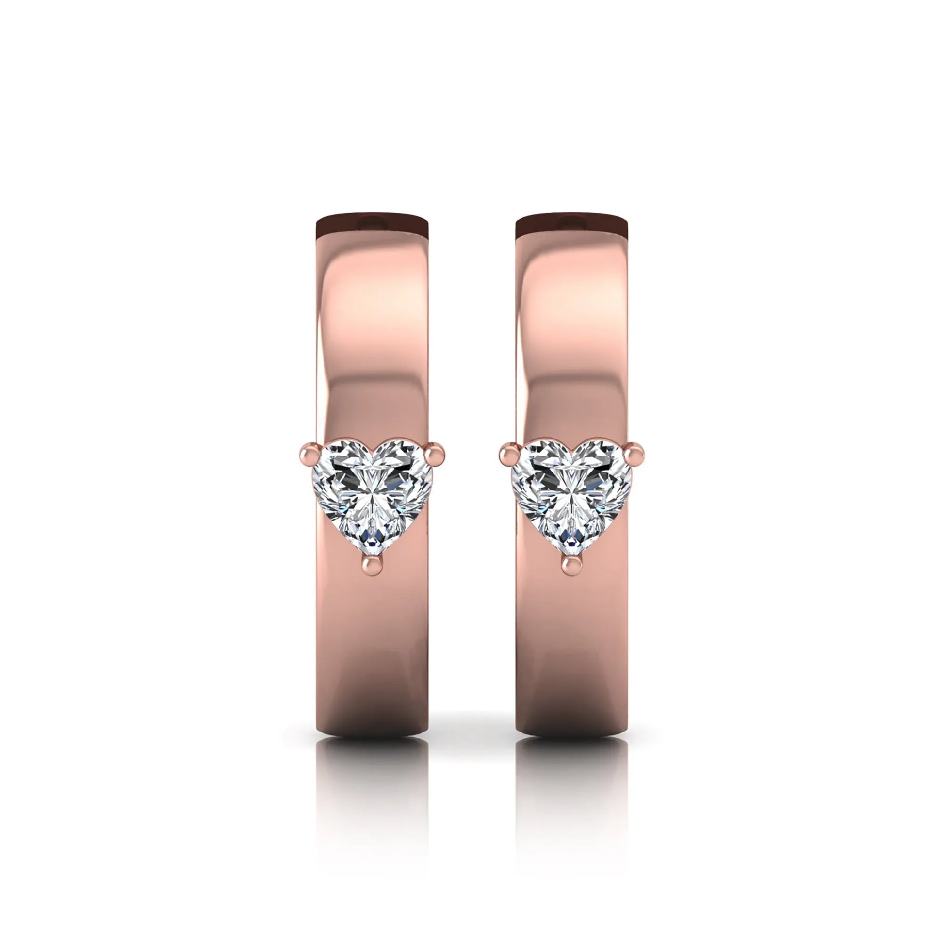 Heart cut lab grown diamond huggie hoop earrings featuring a classic four prong setting and hinged snap closure shown in rose gold tone with a polished finish.