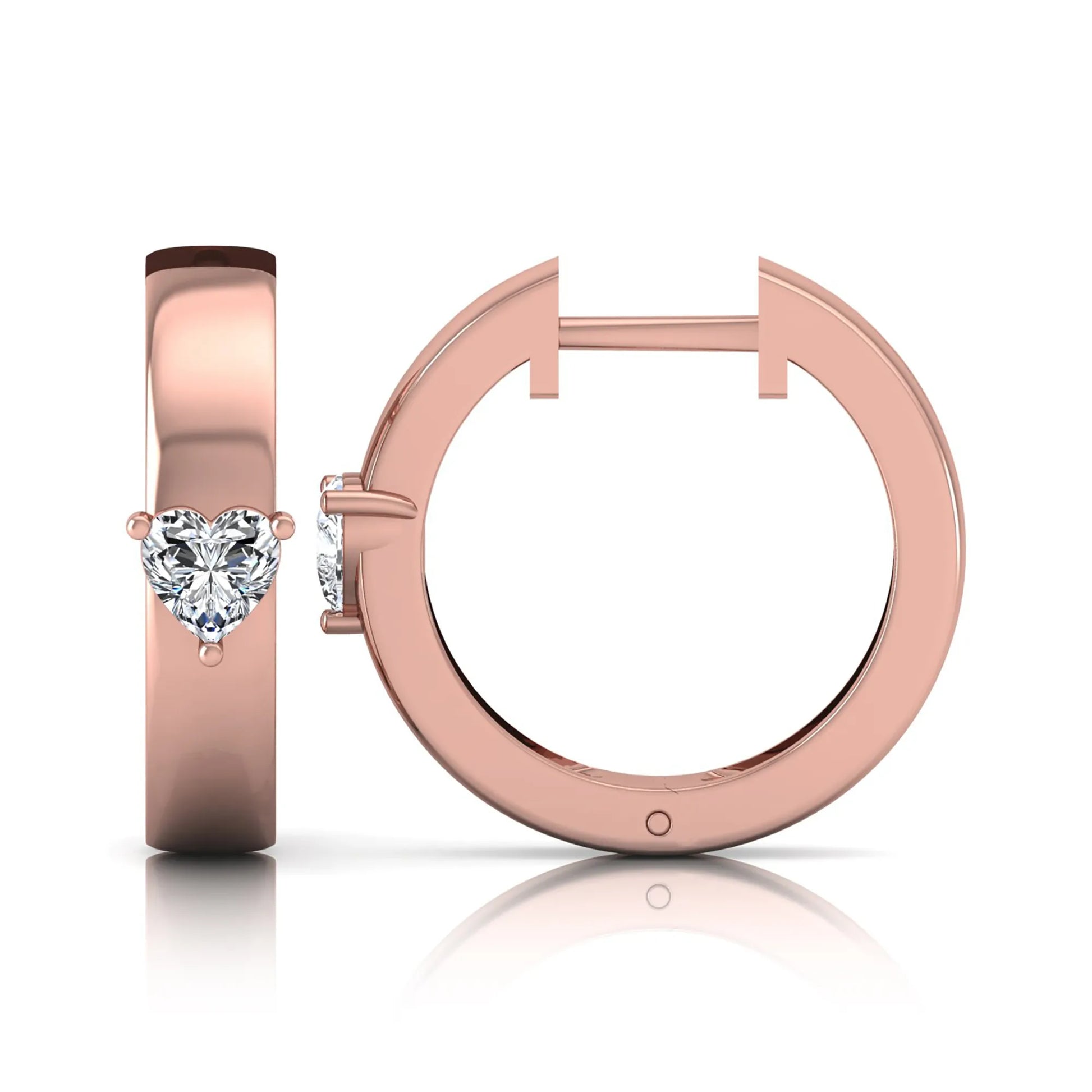 Heart cut lab grown diamond huggie hoop earrings featuring a classic four prong setting and hinged snap closure shown in rose gold tone with a polished finish.