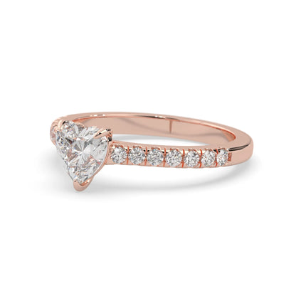 heart cut lab grown diamond prong set engagement ring with pavé band and rose gold metal tone design