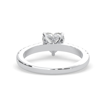 heart cut lab grown diamond prong set engagement ring with pavé band and white gold metal tone design