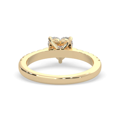 heart cut lab grown diamond prong set engagement ring with pavé band and yellow gold metal tone design