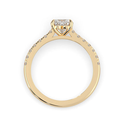 heart cut lab grown diamond prong set engagement ring with pavé band and yellow gold metal tone design