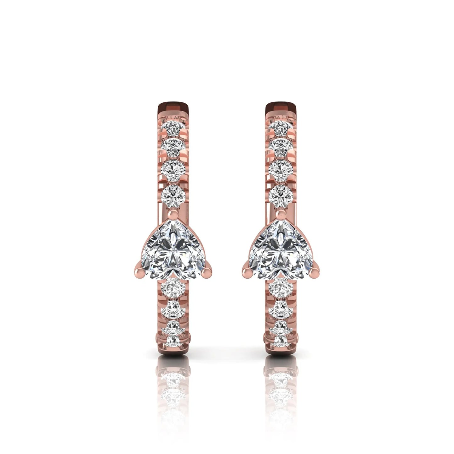 Heart and round cut lab grown diamond pavé huggie hoop earrings featuring a front-facing heart diamond, graduated shared prong round diamonds, hinged snap closure, and polished rose gold finish.