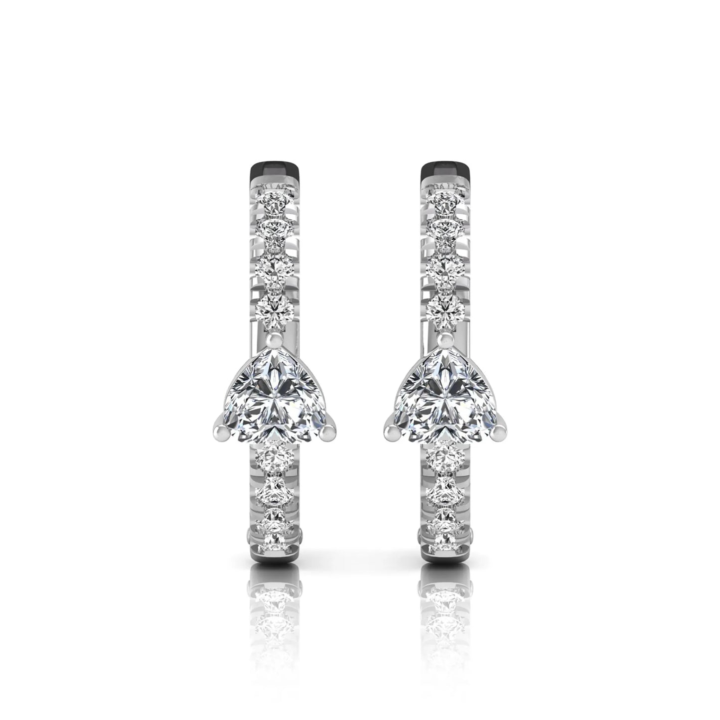 Heart and round cut lab grown diamond pavé huggie hoop earrings featuring a front-facing heart diamond, graduated shared prong round diamonds, hinged snap closure, and polished white gold finish.