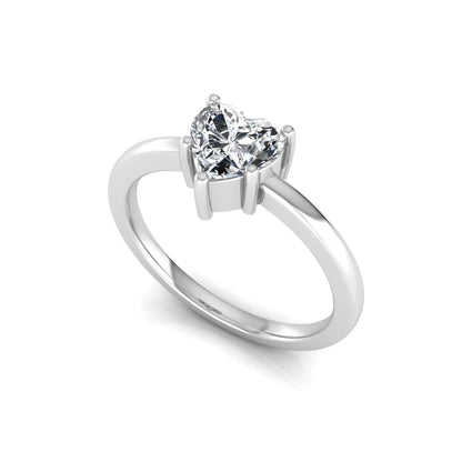 Heart cut lab grown diamond engagement ring featuring a 0.93 carat IGI certified center diamond in an elegant three-prong solitaire setting with a polished white gold band.