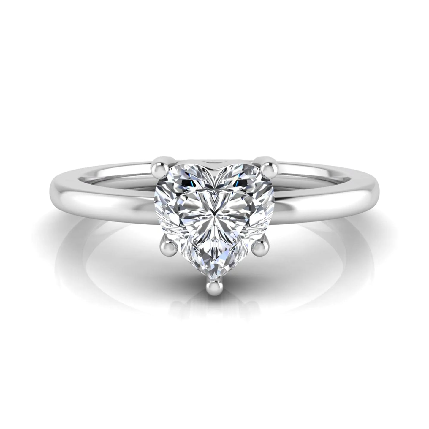 Heart cut lab grown diamond engagement ring featuring a 0.93 carat IGI certified center diamond in an elegant three-prong solitaire setting with a polished white gold band.