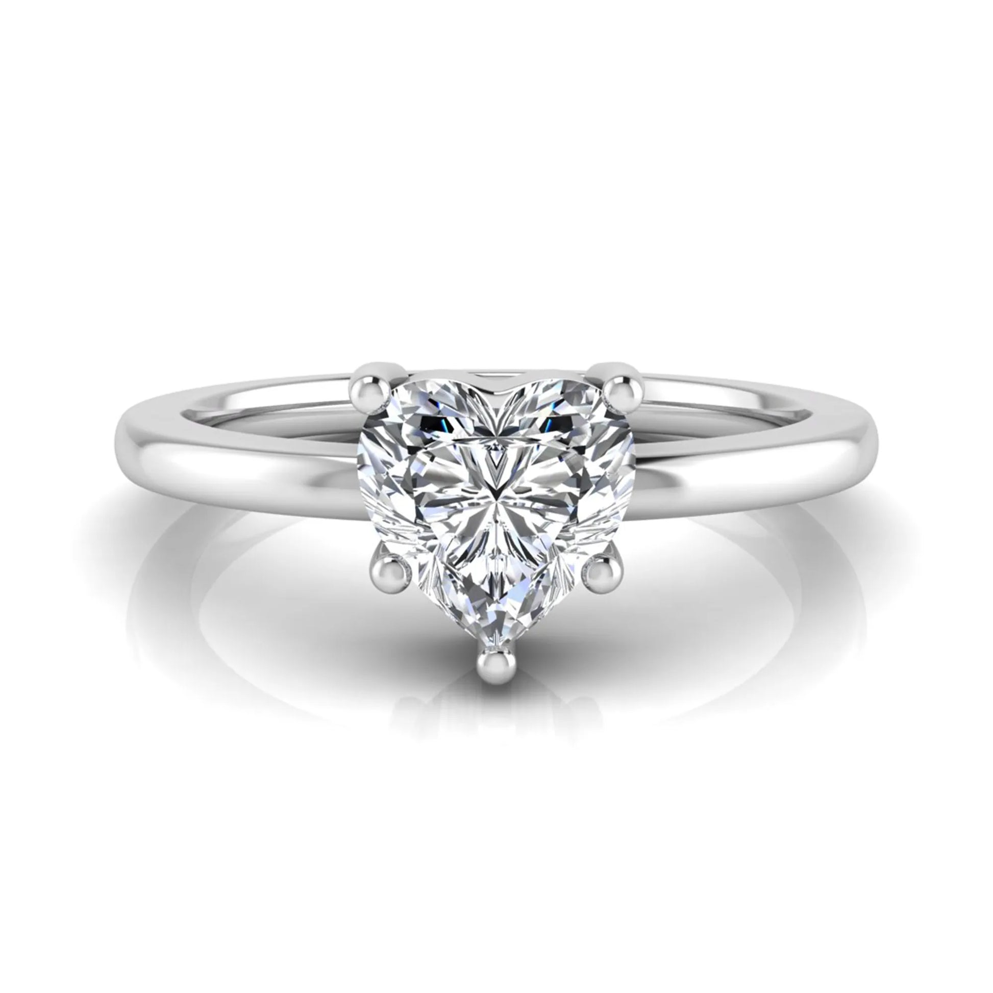 Heart cut lab grown diamond engagement ring featuring a 0.93 carat IGI certified center diamond in an elegant three-prong solitaire setting with a polished white gold band.