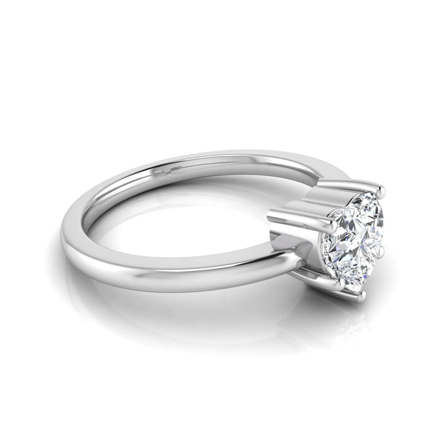 Heart cut lab grown diamond engagement ring featuring a 0.93 carat IGI certified center diamond in an elegant three-prong solitaire setting with a polished white gold band.