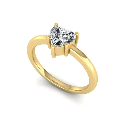 Heart cut lab grown diamond engagement ring featuring a 0.93 carat IGI certified center diamond in an elegant three-prong solitaire setting with a polished yellow gold band.
