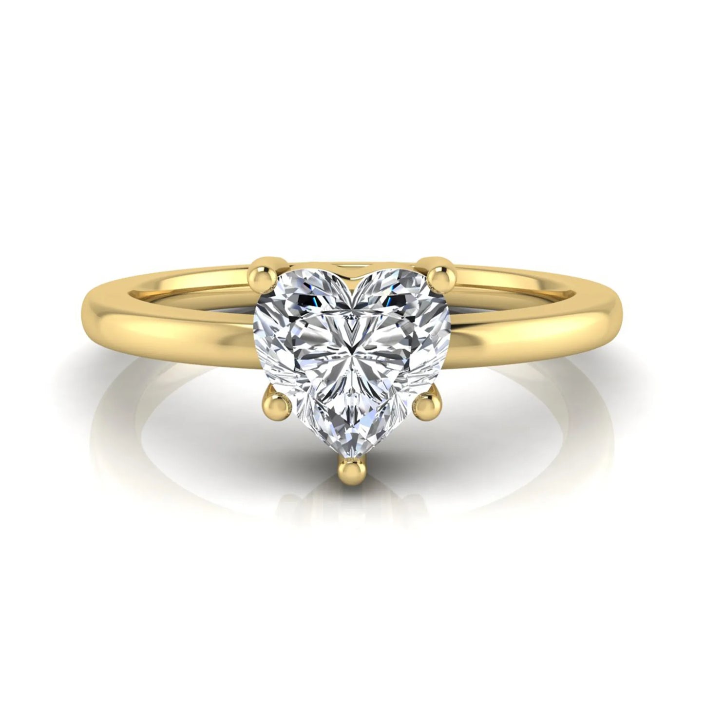 Heart cut lab grown diamond engagement ring featuring a 0.93 carat IGI certified center diamond in an elegant three-prong solitaire setting with a polished yellow gold band.