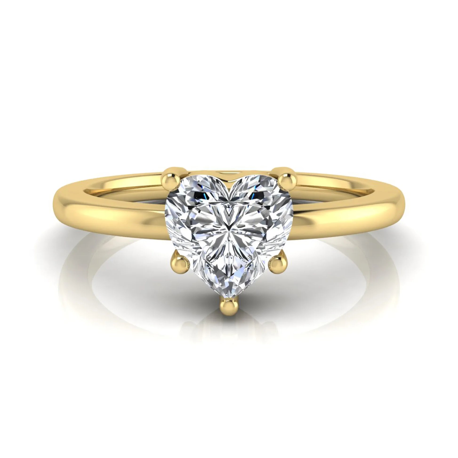 Heart cut lab grown diamond engagement ring featuring a 0.93 carat IGI certified center diamond in an elegant three-prong solitaire setting with a polished yellow gold band.