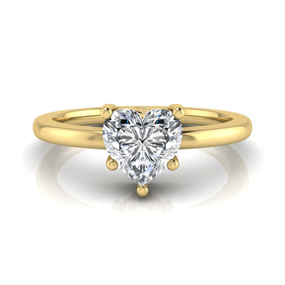 Heart cut lab grown diamond engagement ring featuring a 0.93 carat IGI certified center diamond in an elegant three-prong solitaire setting with a polished yellow gold band.