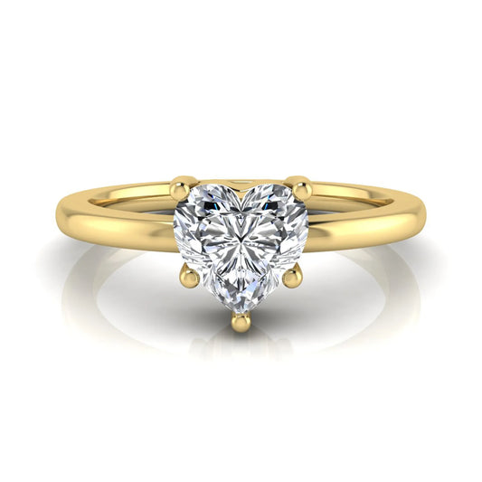 Heart cut lab grown diamond engagement ring featuring a 0.93 carat IGI certified center diamond in an elegant three-prong solitaire setting with a polished yellow gold band.