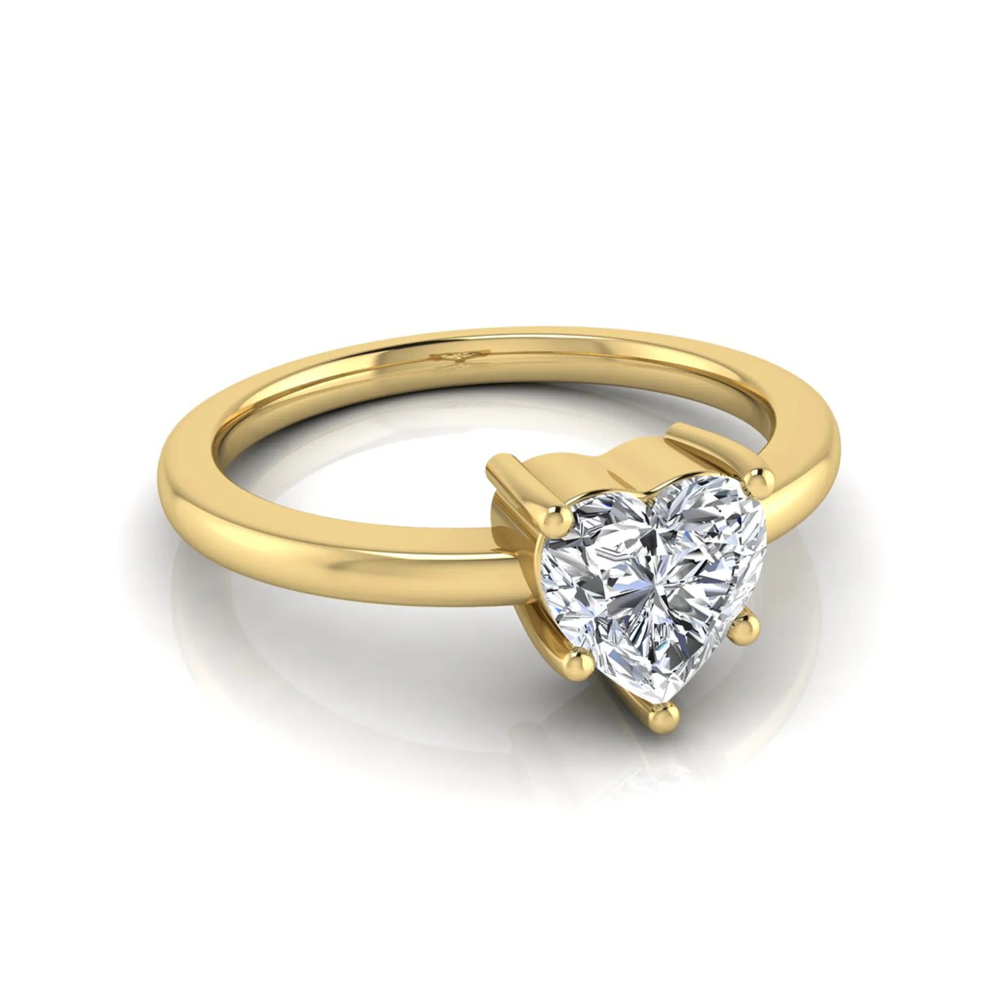 Heart cut lab grown diamond engagement ring featuring a 0.93 carat IGI certified center diamond in an elegant three-prong solitaire setting with a polished yellow gold band.
