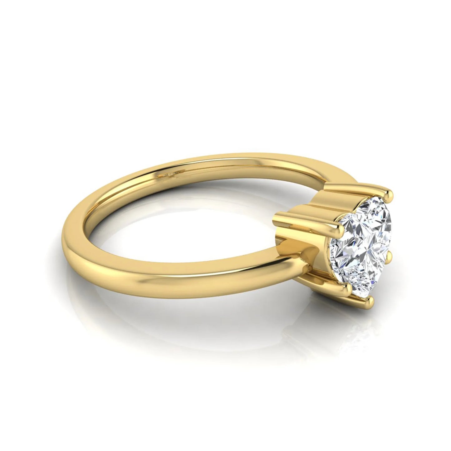 Heart cut lab grown diamond engagement ring featuring a 0.93 carat IGI certified center diamond in an elegant three-prong solitaire setting with a polished yellow gold band.