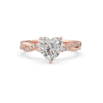 Heart brilliant lab grown diamond engagement ring with prong setting and twisted pavé diamond band in rose gold tone