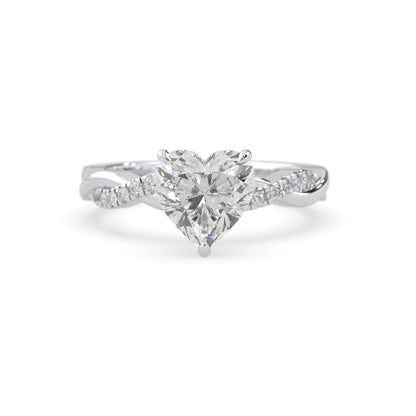Heart brilliant lab grown diamond engagement ring with prong setting and twisted pavé diamond band in white gold tone