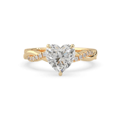 Heart brilliant lab grown diamond engagement ring with prong setting and twisted pavé diamond band in yellow gold tone