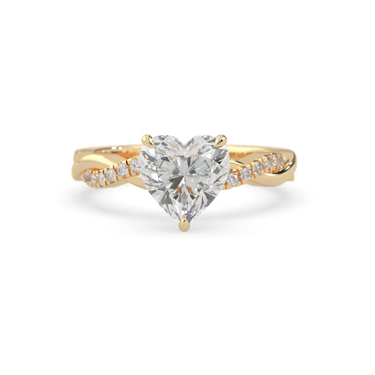 Heart brilliant lab grown diamond engagement ring with prong setting and twisted pavé diamond band in yellow gold tone