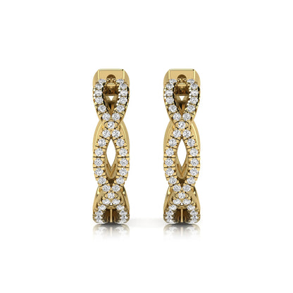 Infinity pavé lab grown diamond huggie hoop earrings featuring round brilliant diamonds in an open infinity design with additional pavé diamonds on a yellow gold hinged hoop.