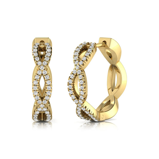 Infinity pavé lab grown diamond huggie hoop earrings featuring round brilliant diamonds in an open infinity design with additional pavé diamonds on a yellow gold hinged hoop.