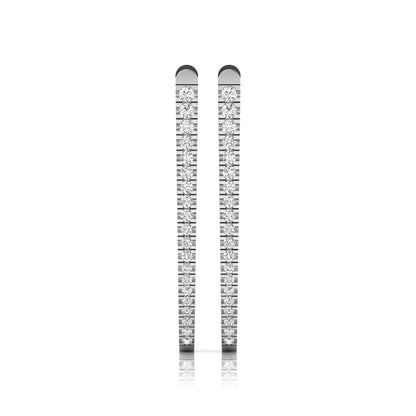 Inside-out round cut lab grown diamond hoop earrings with shared prong setting, elongated oval silhouette, hinged snap closure, and white gold tone.