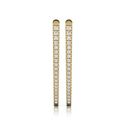 Inside-out round cut lab grown diamond hoop earrings with shared prong setting, elongated oval silhouette, hinged snap closure, and yellow gold tone.
