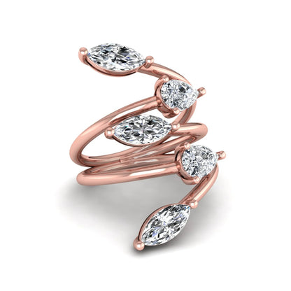 Marquise and pear cut lab grown diamond bypass wrap ring featuring alternating diamonds in a flowing rose gold tone prong setting.