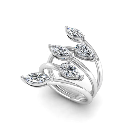 Marquise and pear cut lab grown diamond bypass wrap ring featuring alternating diamonds in a flowing white gold tone prong setting.