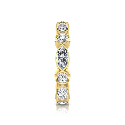 Marquise and round cut lab grown diamond full eternity band featuring alternating diamonds in a modern bezel-inspired setting in yellow gold