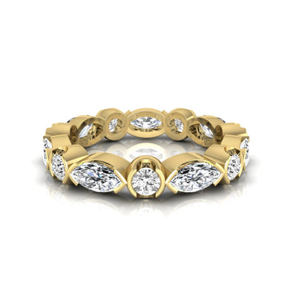 Marquise and round cut lab grown diamond full eternity band featuring alternating diamonds in a modern bezel-inspired setting in yellow gold